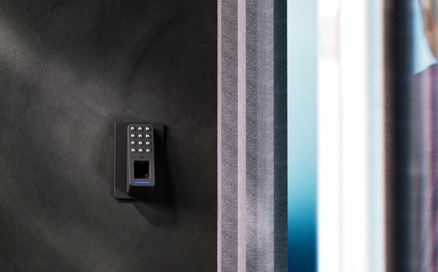 UA-Retrofit-Reader-Fingerprint-B installed beside an entry door
