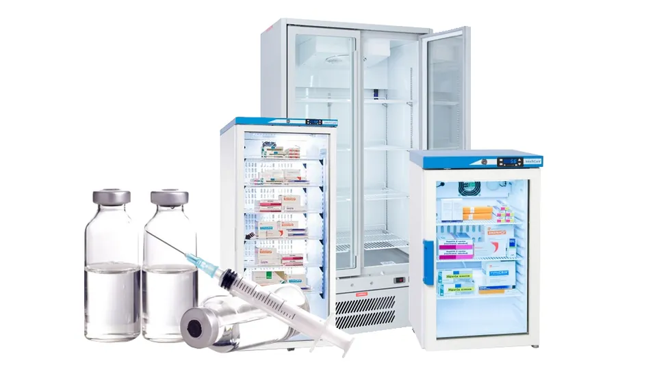 Vaccine and medical refrigerators with vials and syringe, kept at temperature by a UPS during outages