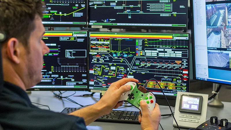 Mining operator controlling an autonomous haul truck from a remote operations centre
