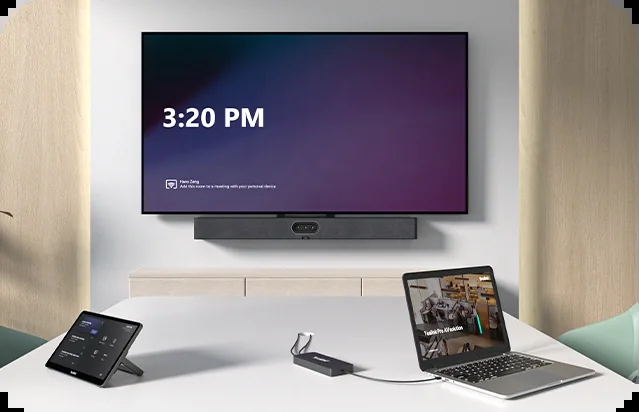 Yealink USB video bar with BYOD Box and a laptop on the meeting table