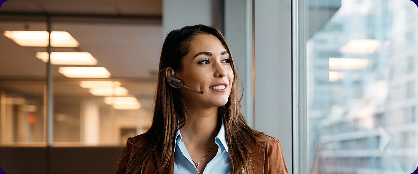 Front-office staff member wearing a Yealink WH63 DECT headset
