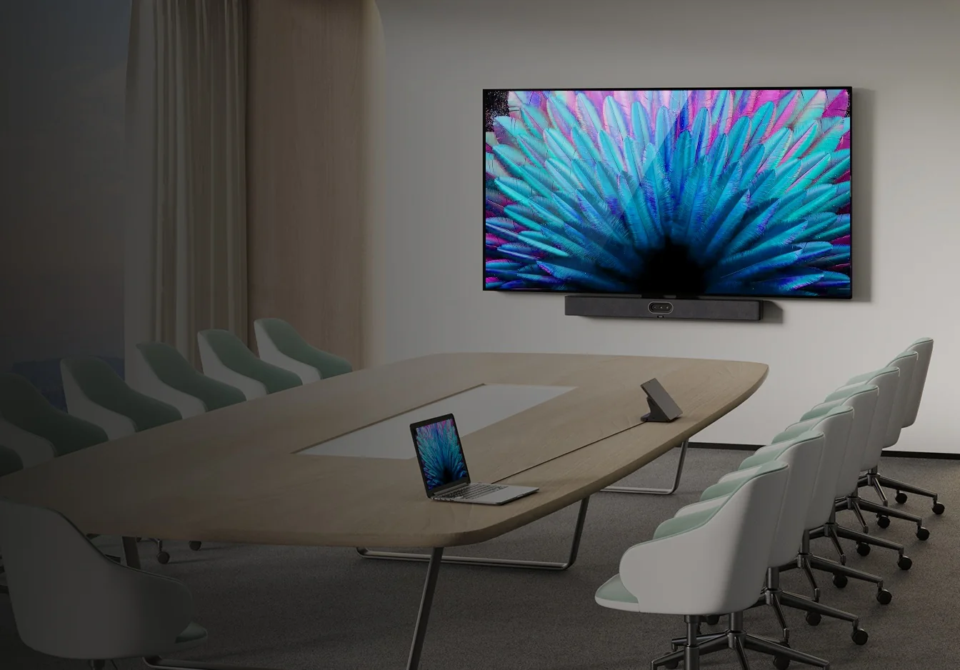 Yealink MeetingBar A50 under a wall display with a CTP25 touch console on the table of a medium meeting room