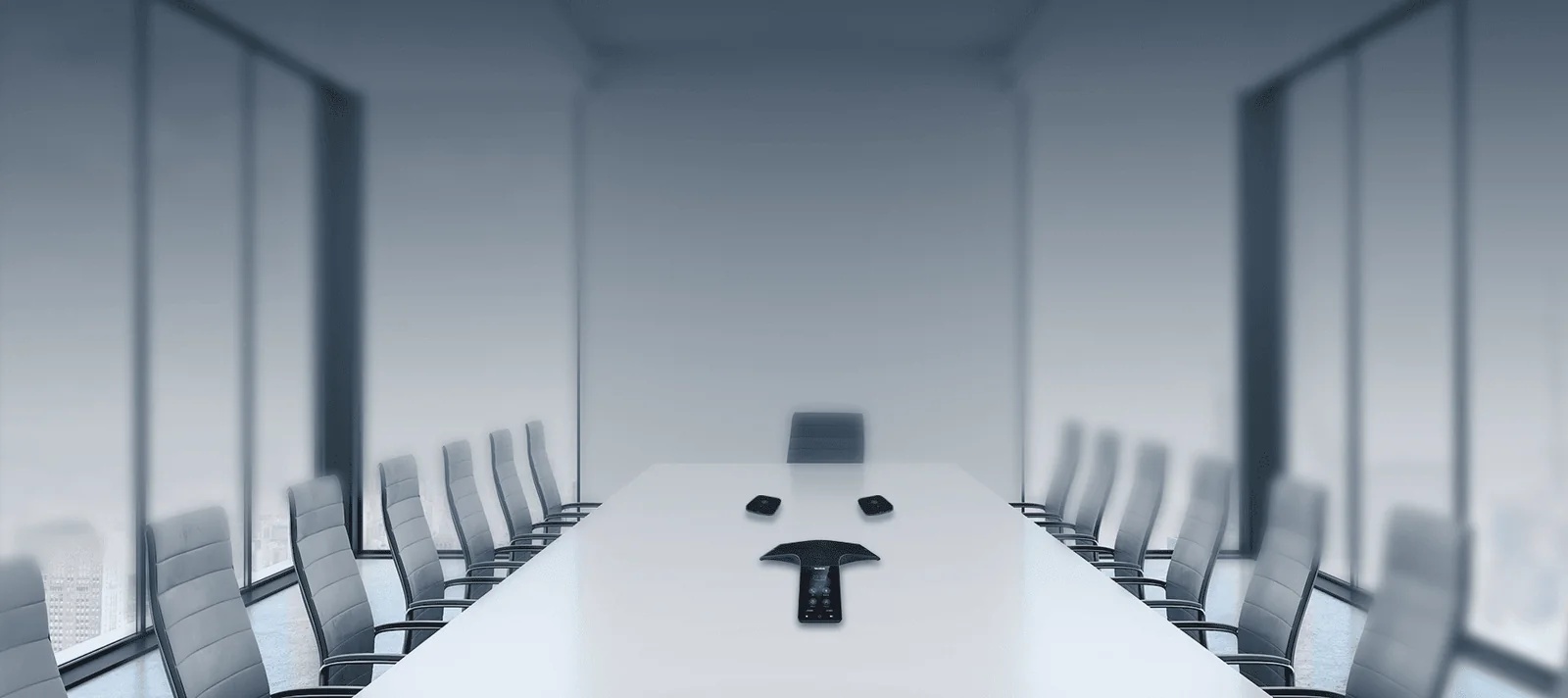 Yealink CP965 conference phone in the middle of a long boardroom table