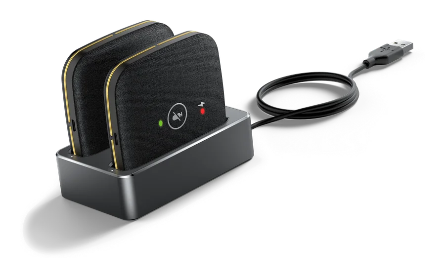 Pair of Yealink CPW65 wireless DECT expansion microphones on their charging cradle
