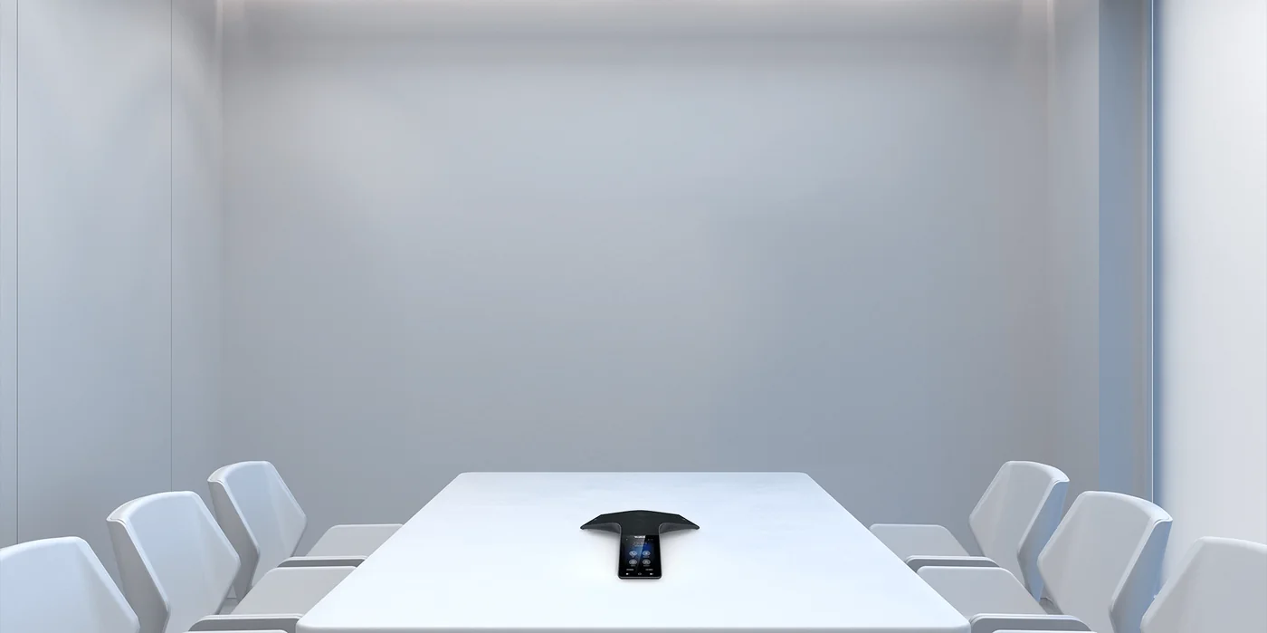 Yealink CP925 conference phone on a meeting room table