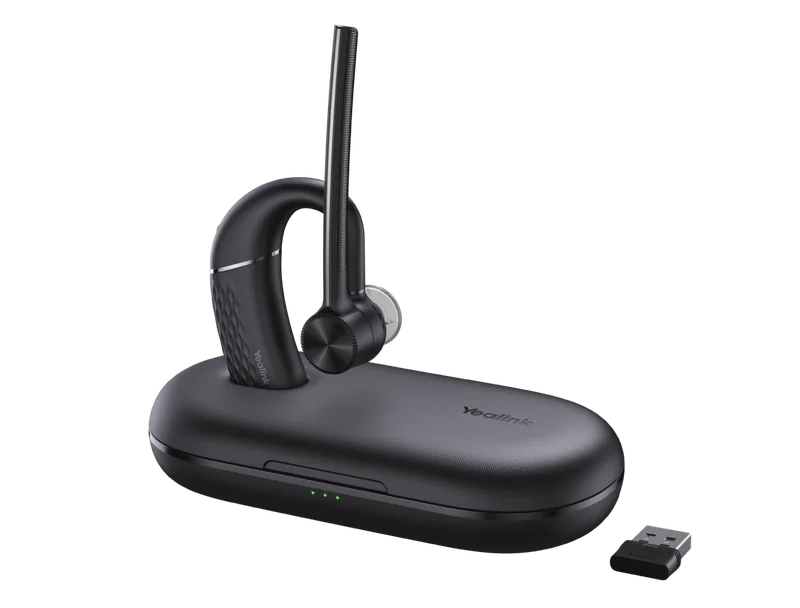 Yealink BH71 Pro mono Bluetooth earpiece in its charging case with USB dongle
